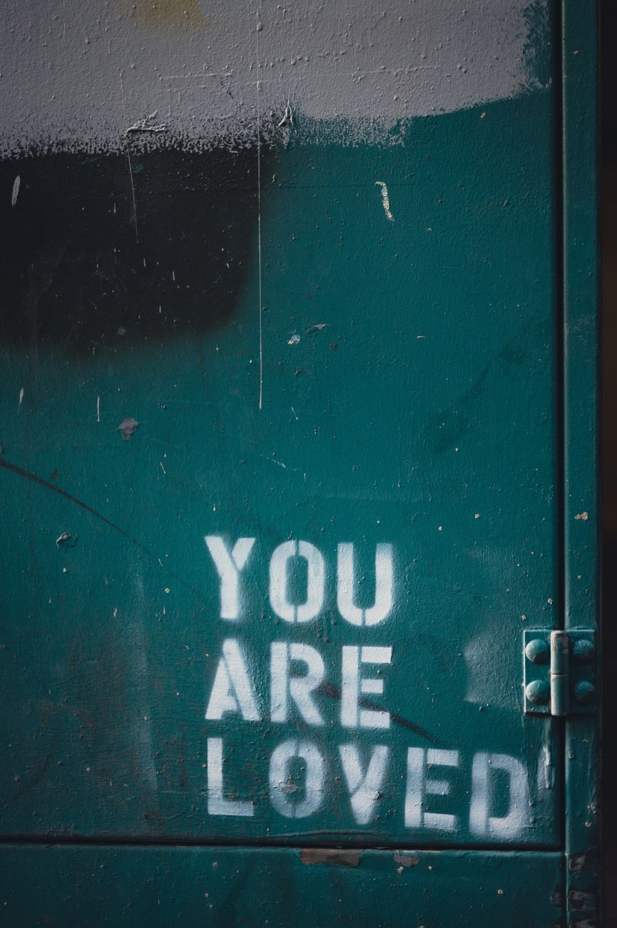 you are loved text on wall